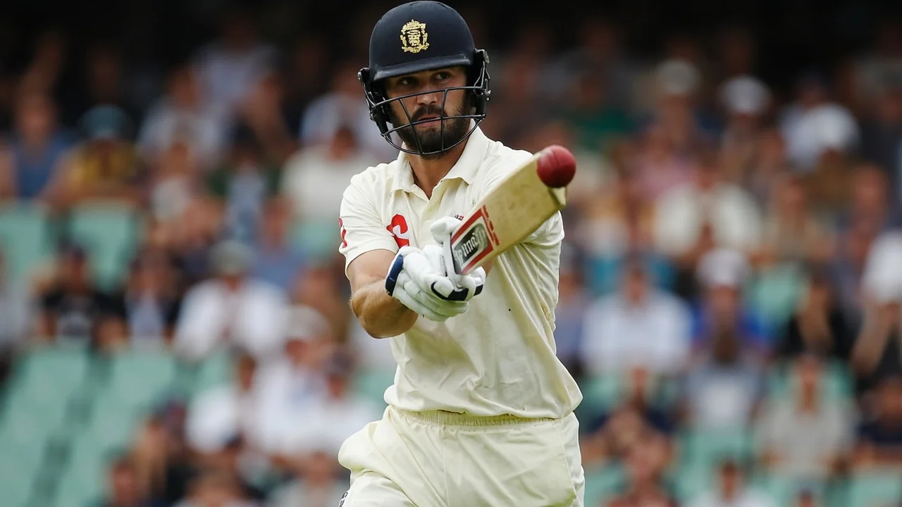 England batter playing a controlled front-foot shot through the covers during a Test match session